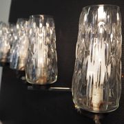 Pair of wall lights from the 1950s-1960s with a push button switch.