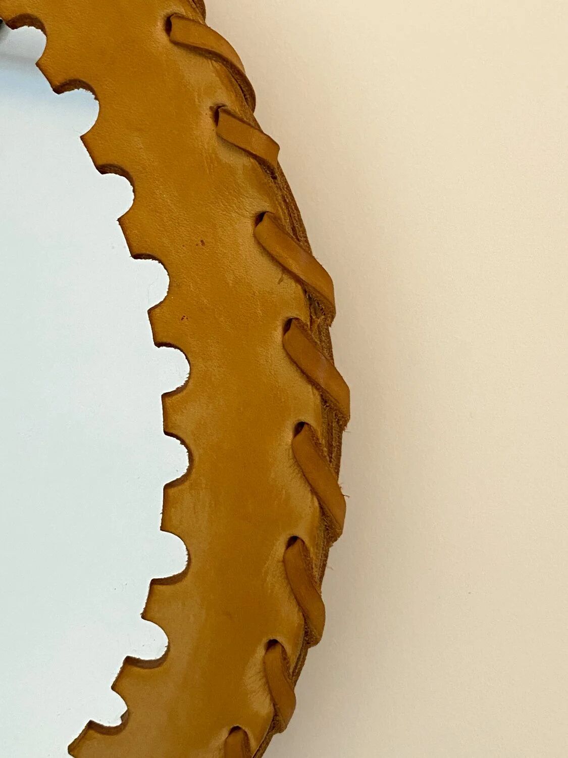 Round leather saddle mirror