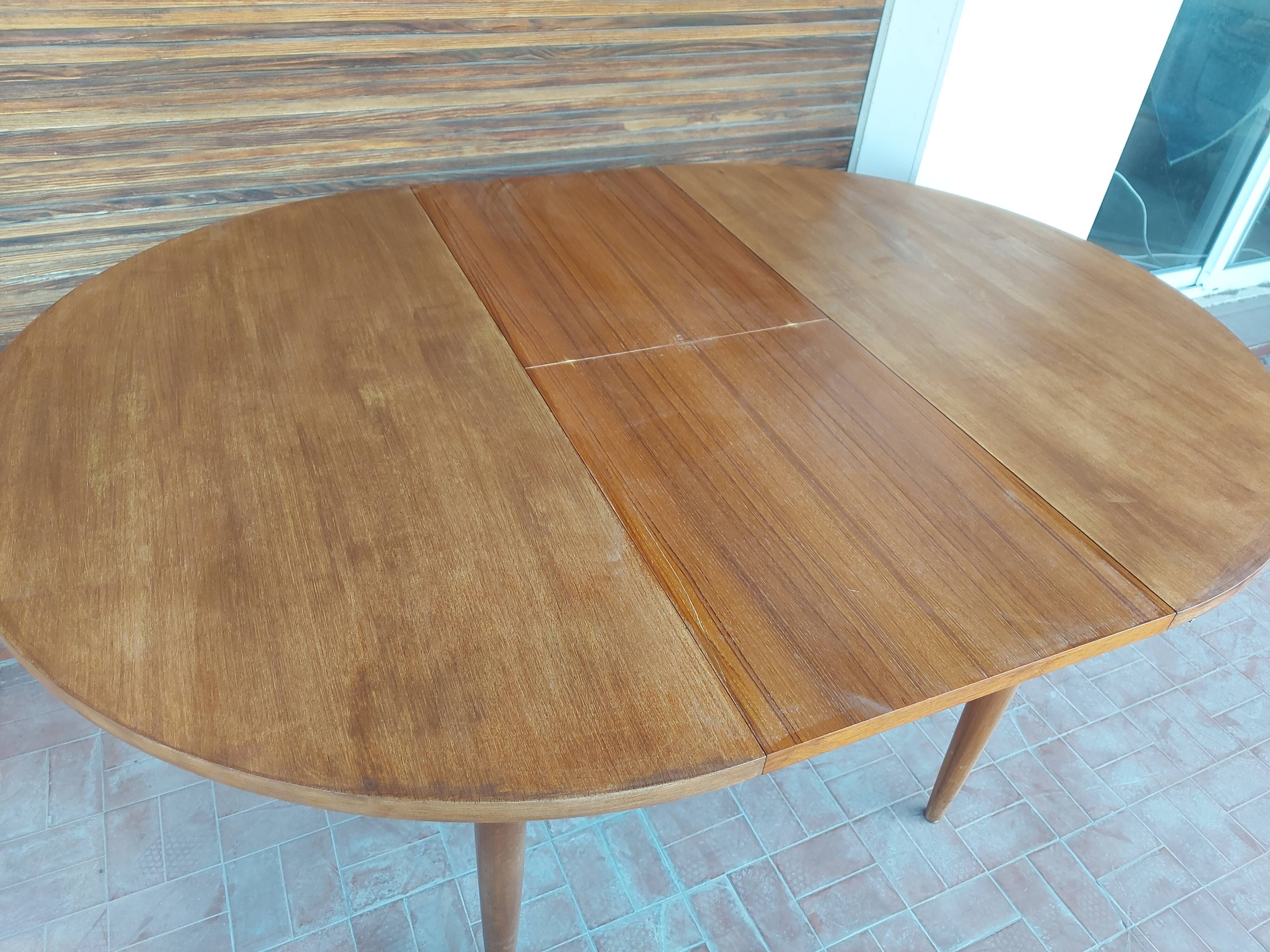 Scandinavian design teak table with extension cord