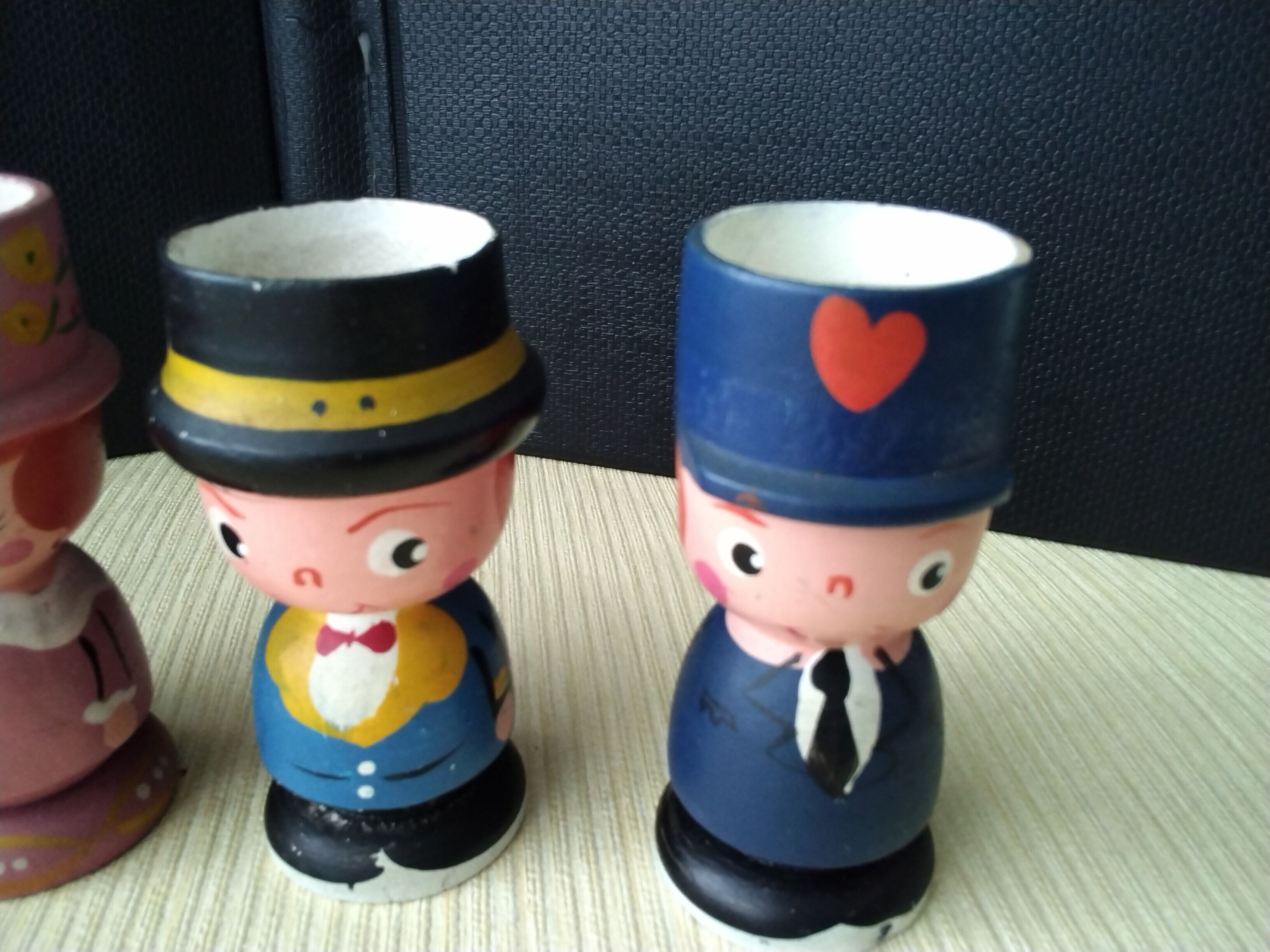 Set of 4 painted wooden characters eggcups