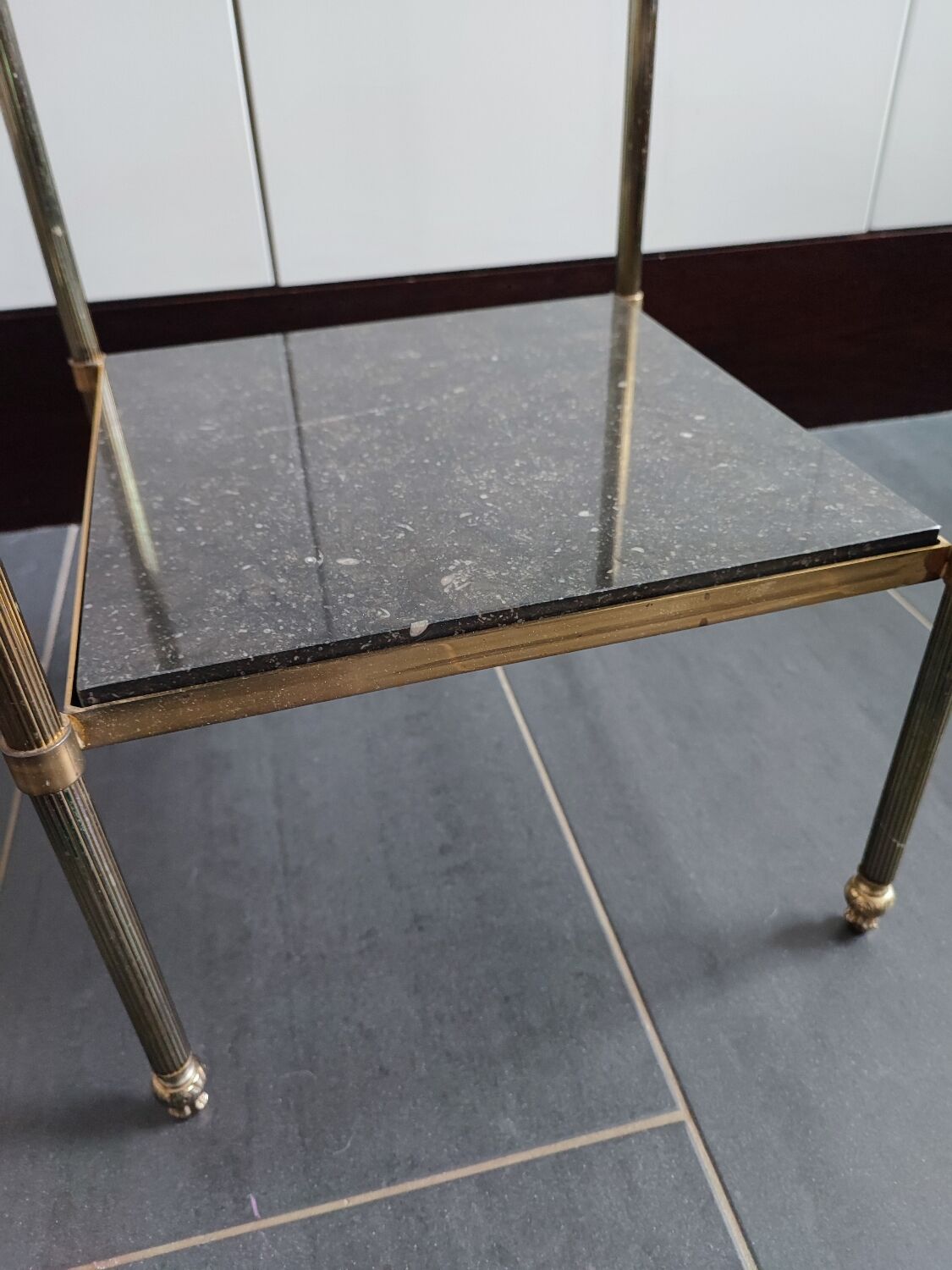 Black marble and brass stool