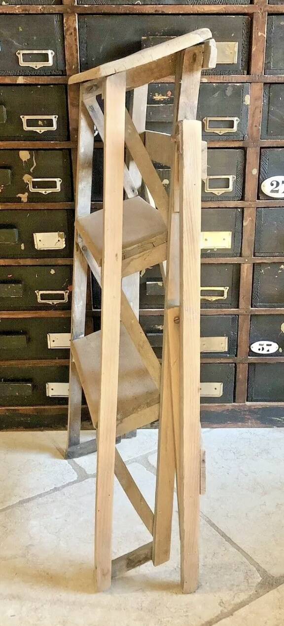 Old small painter's stepladder, wooden trade furniture, step stool