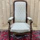 Fauteuil Voltaire du XIXème en noyer - L=68cm, P=78cm, H=1m07, H assise=40cm.