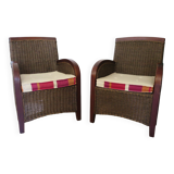 2 armchairs in woven rattan and wood, 1980s