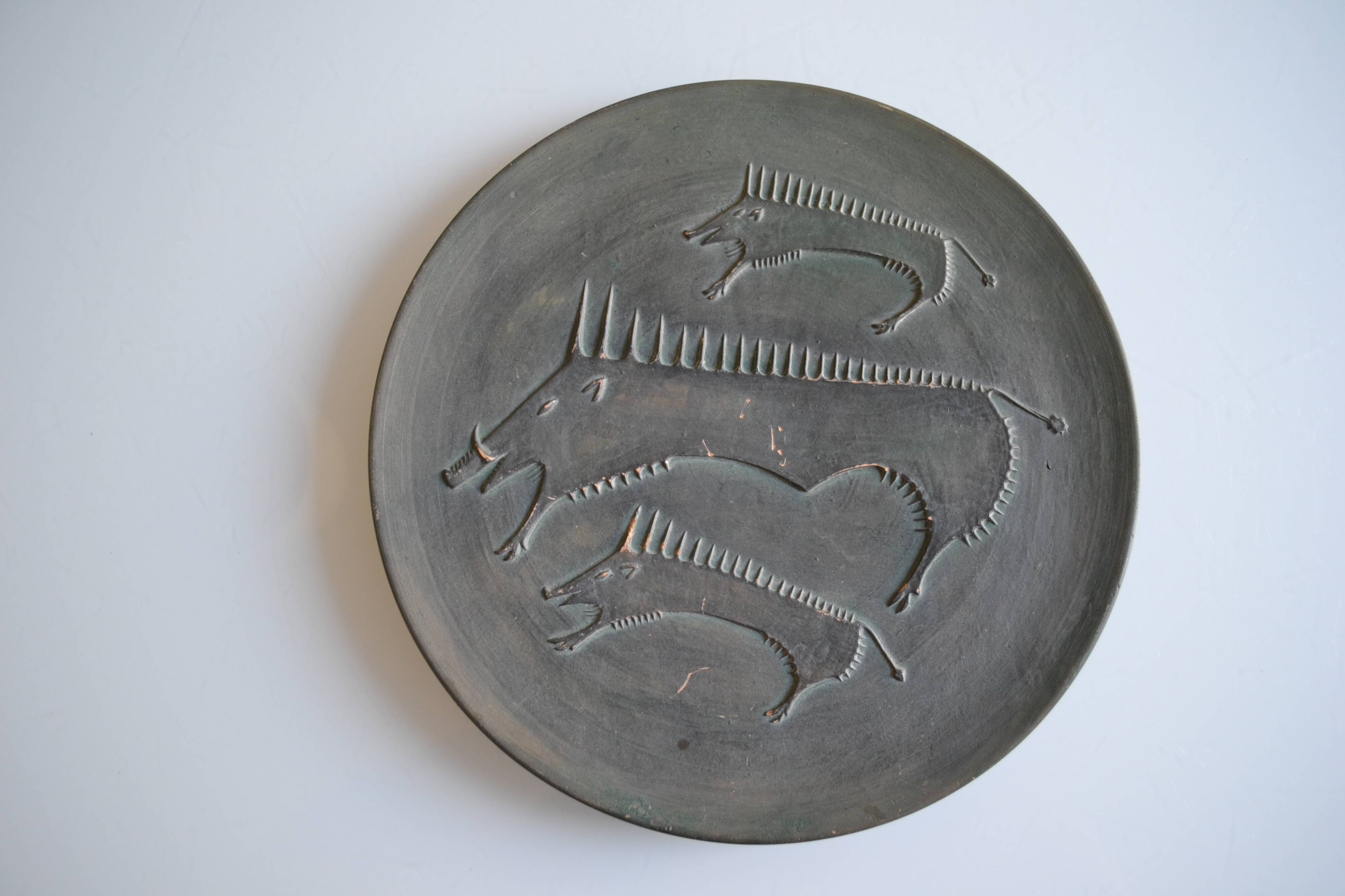 Ceramic wall plate attributed to Wim Mühlendyk