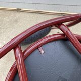 Metallic burgundy bistro chair for restaurants and communities with gray fabric