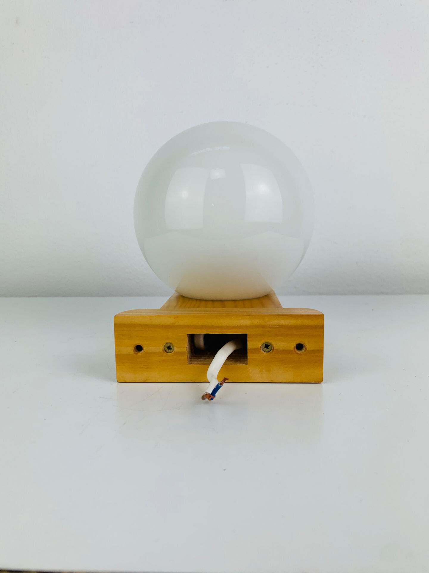 Vintage Tissot opaline globe and pin wall light.