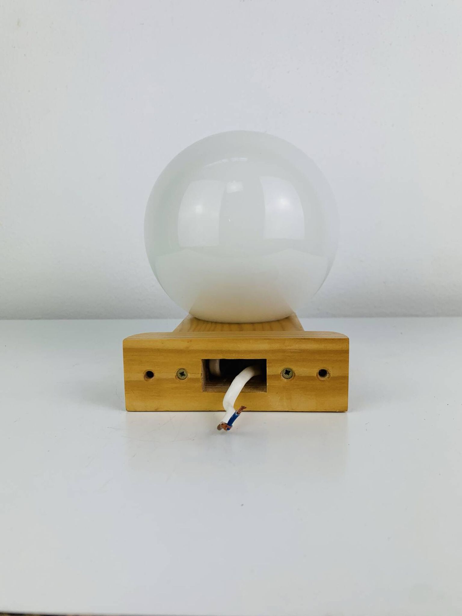 Vintage Tissot opaline globe and pin wall light.