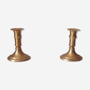 Pair of candlesticks in solid brass golden