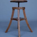Industrial adjustable piano stool. 1930s