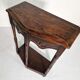 Pair of English 1920s carved oak sidetables