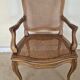 Fauteuil style Régence en bois et cannage