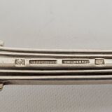 12 couverts en métal argenté modèle au filet