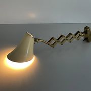 Cream metal and brass wall lamp with scissors design by Karl Lang for SIS Licht, 1950s, Germany.