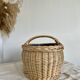Large vintage wicker basket and blue lining with white polka dots