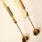Pair of Pierre Forsell solid brass candlesticks for Skultuna