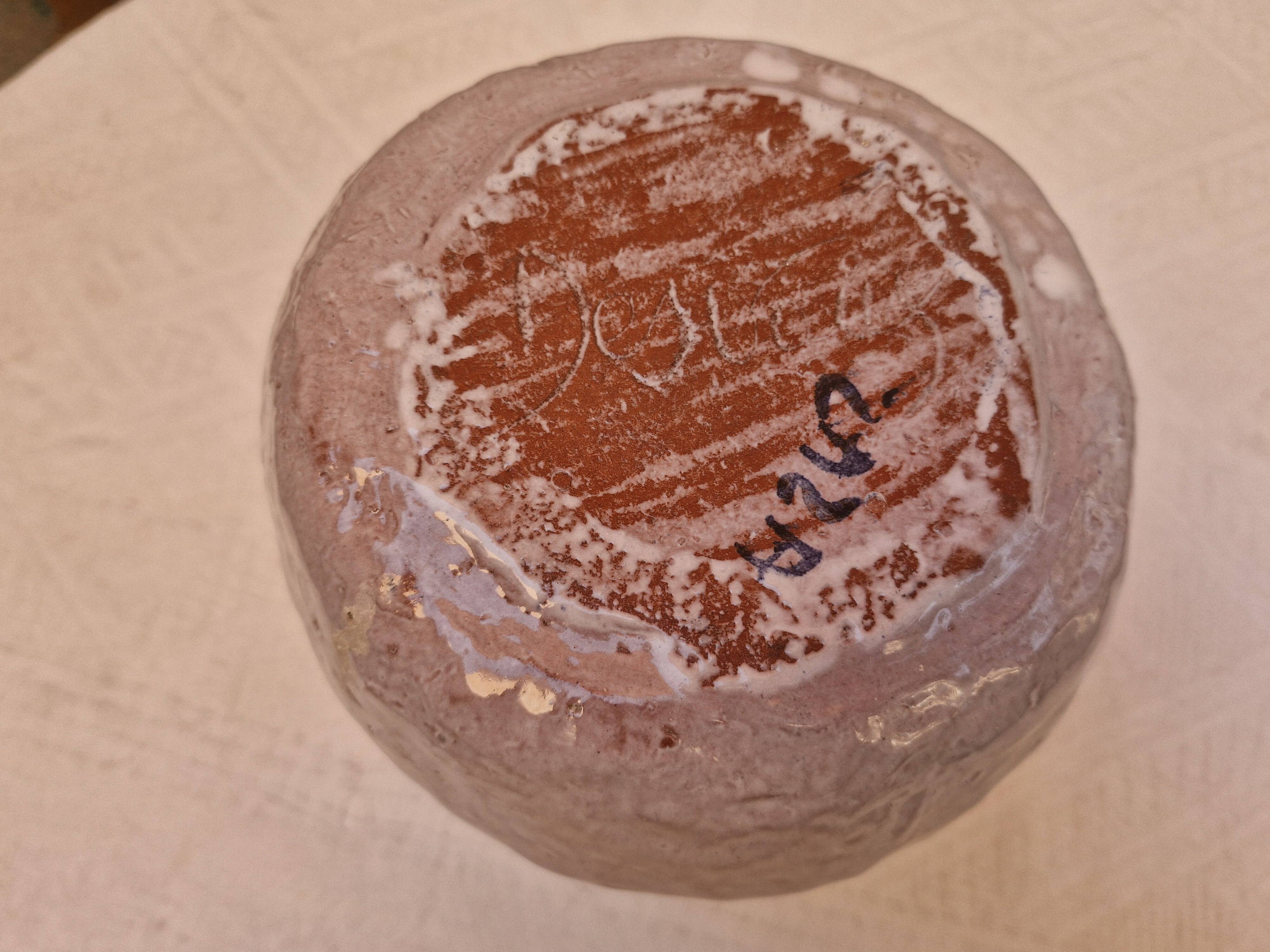 Old stamped glazed terracotta jug