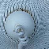 White perforated sheet metal chandelier