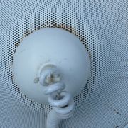 White perforated sheet metal chandelier
