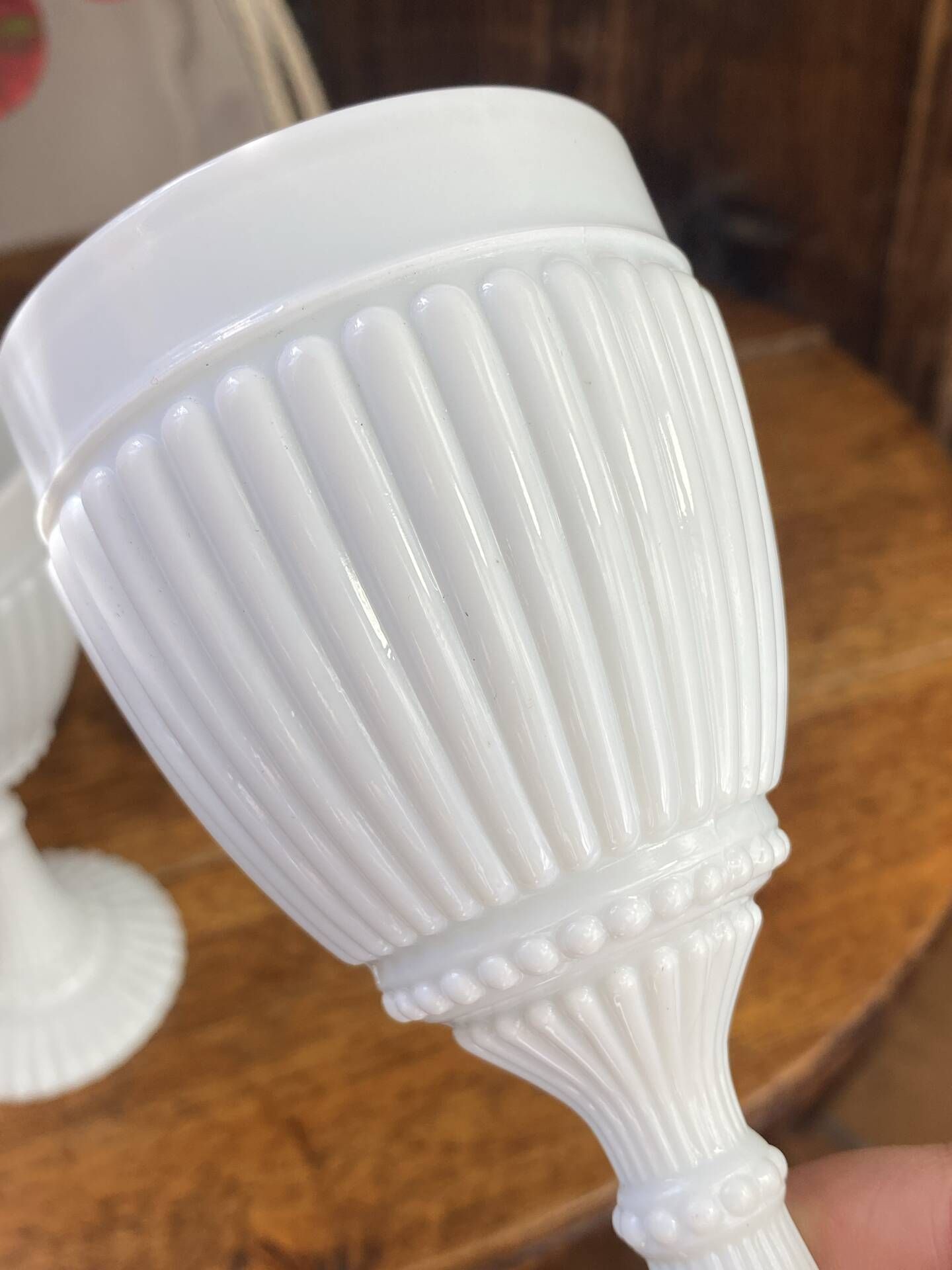 Footed glasses, white opaline chalices