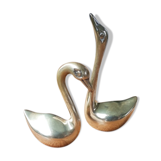 Duo brass swans