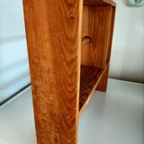 Wooden shelf with unroller wipes everything