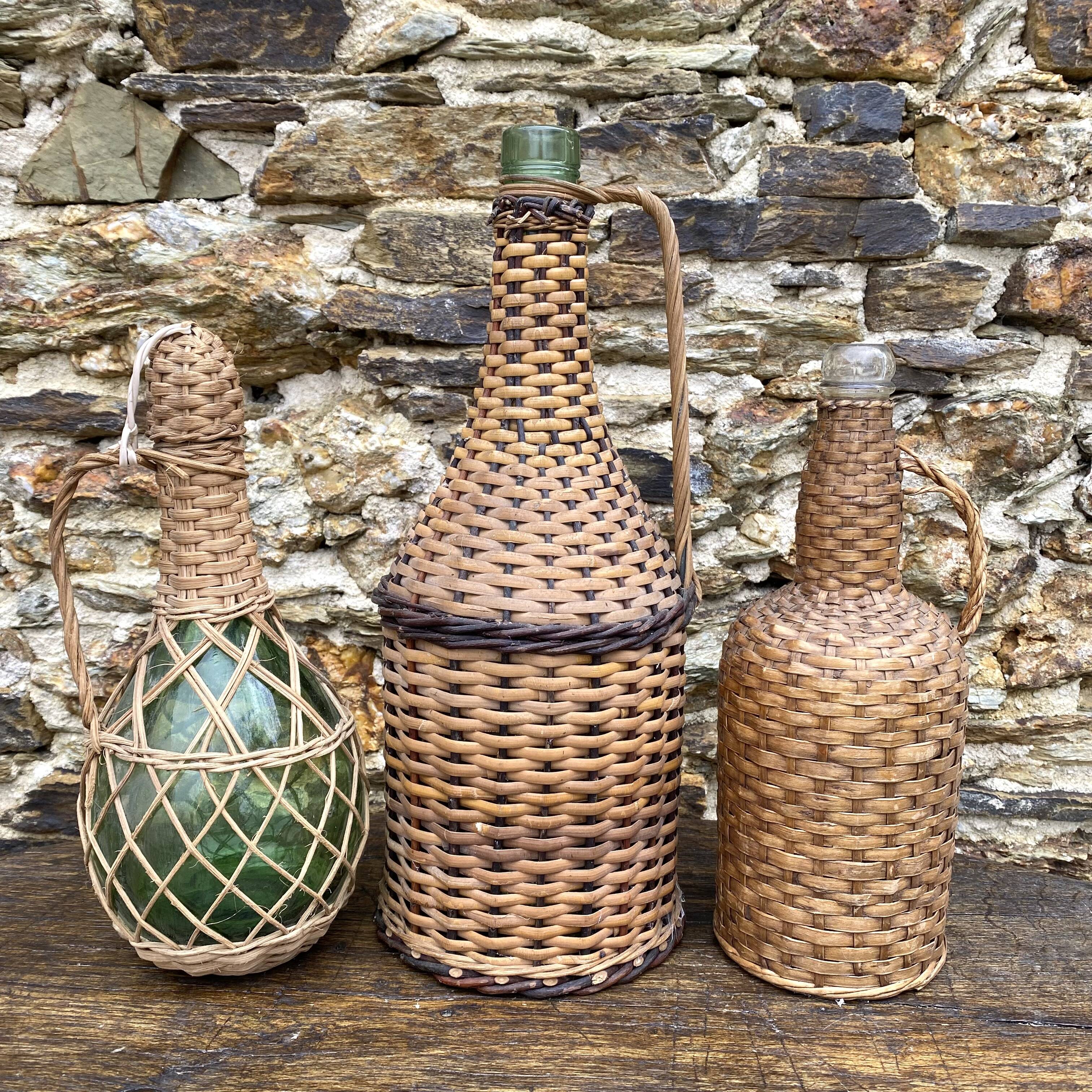Glass bottles and rattan, woven wicker