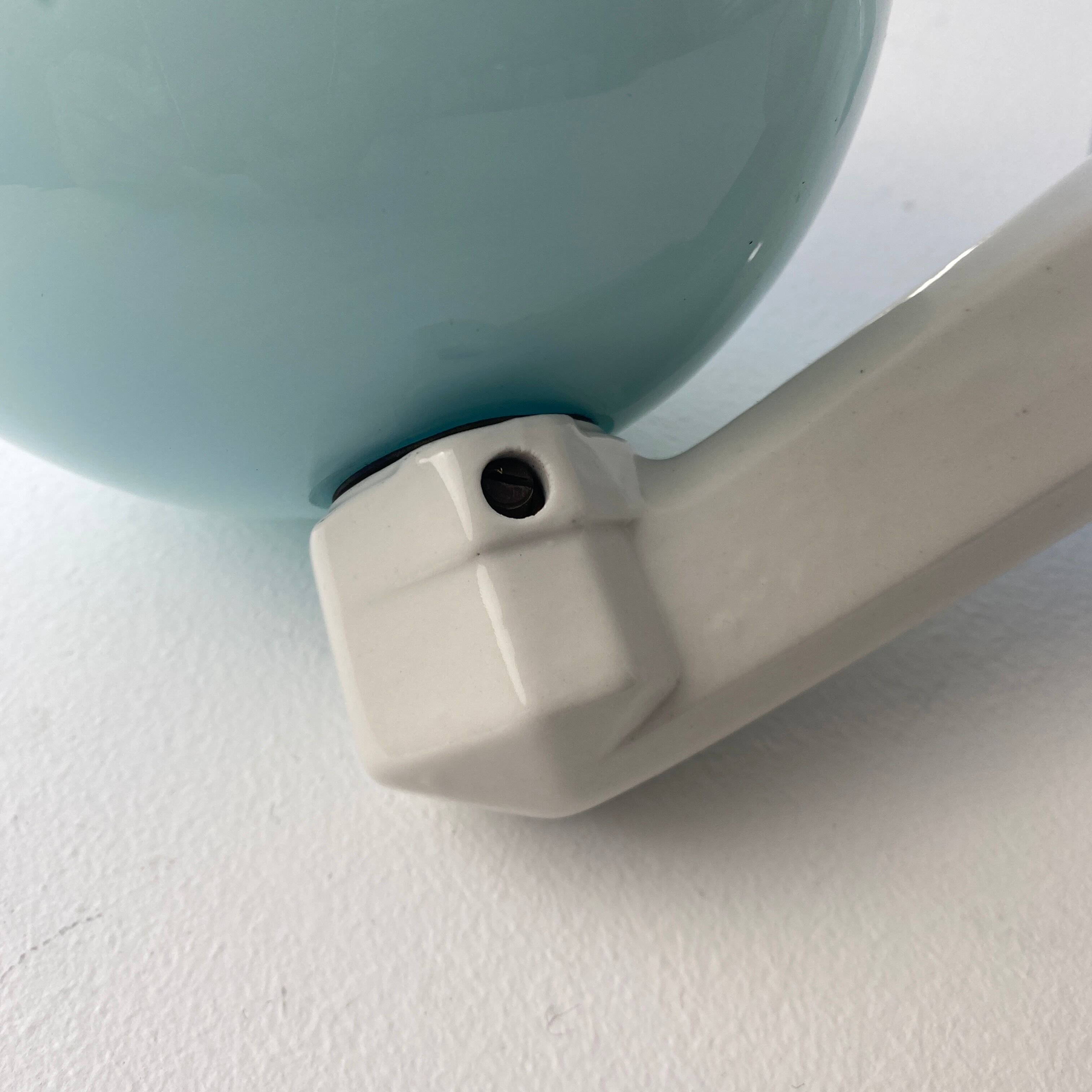 Old porcelain and vintage opaline wall lamp