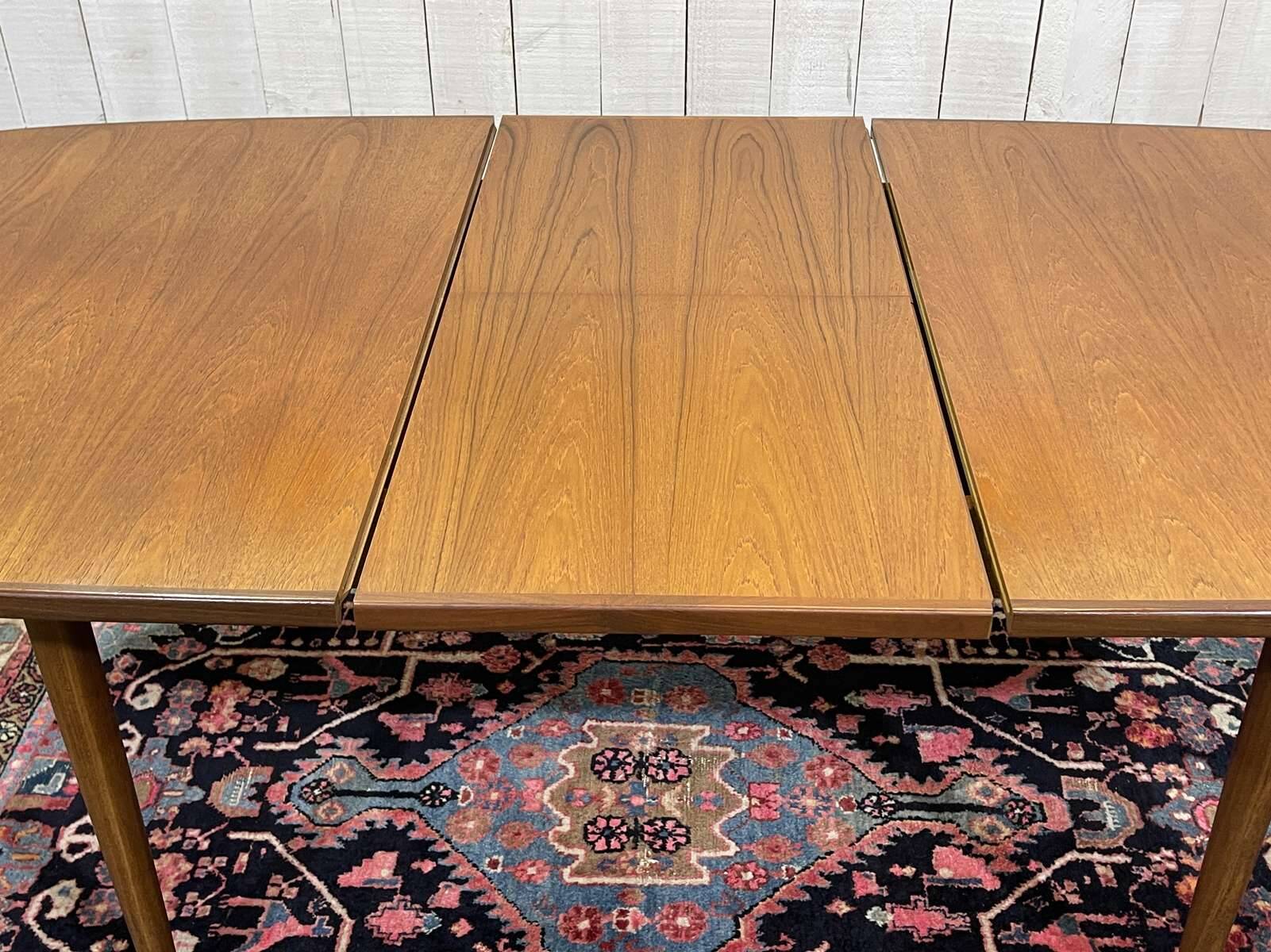 G-Plan teak table from the 1970s with butterfly extension.