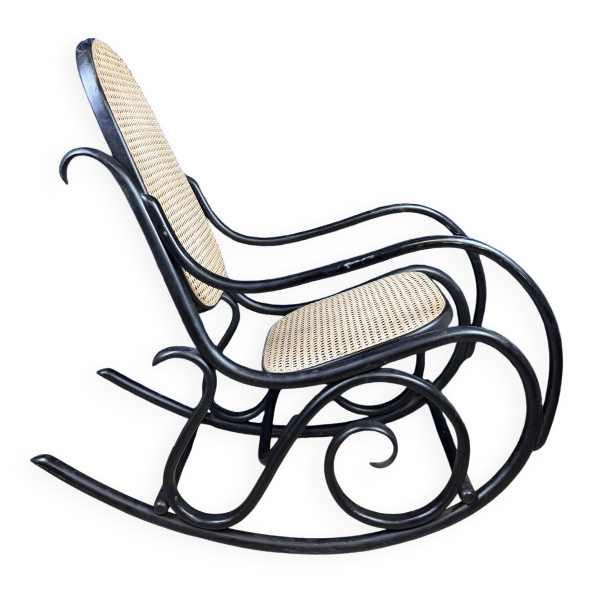 Beautiful rocking chair in the style of Thonet in blackened curved wood