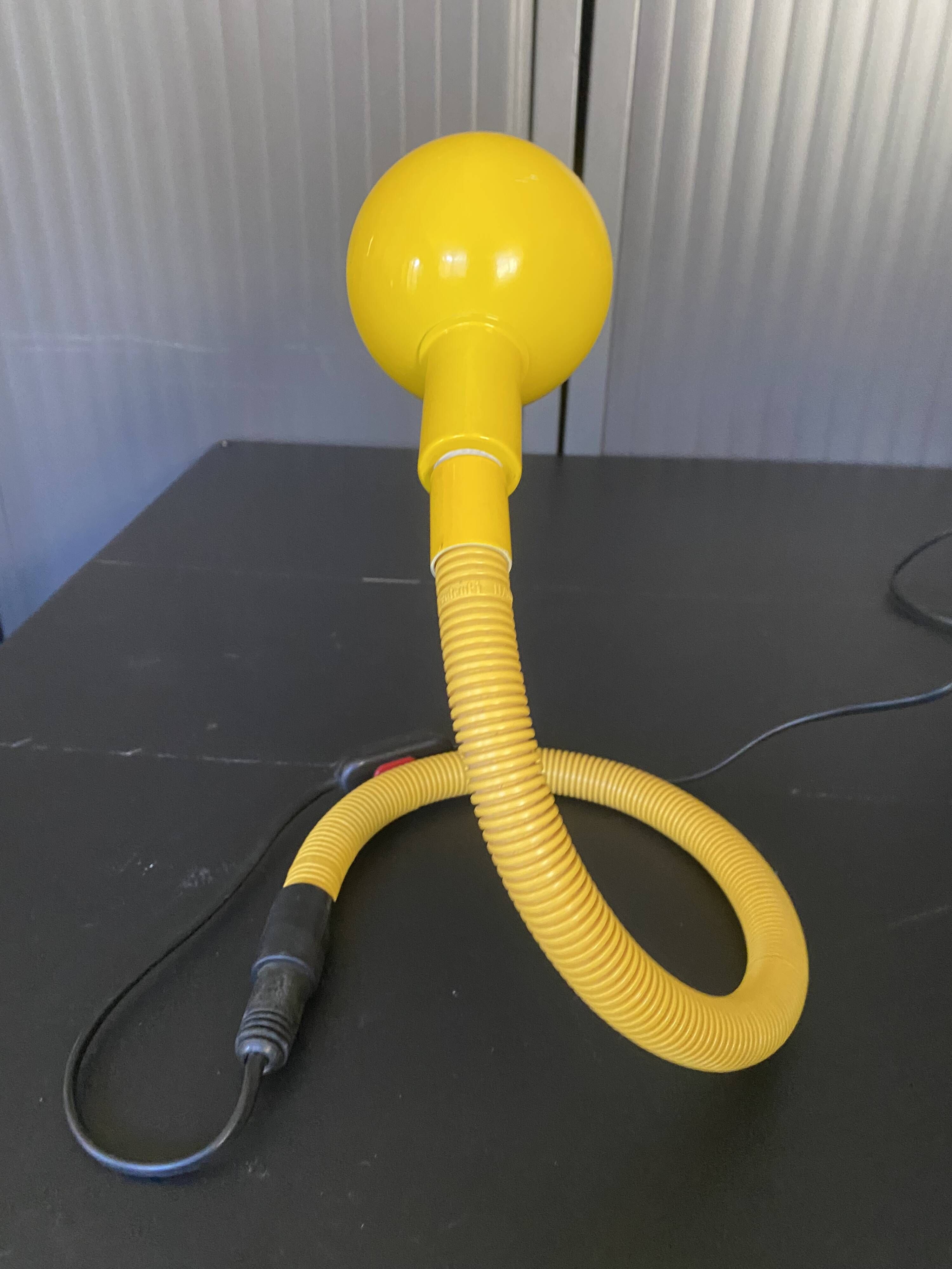 Yellow Hebi lamp by Isao Hosoe for Valenti, vintage pop yellow from the 1970s.