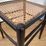 Light wooden chair with caning