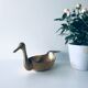 Empty brass duck empty pocket