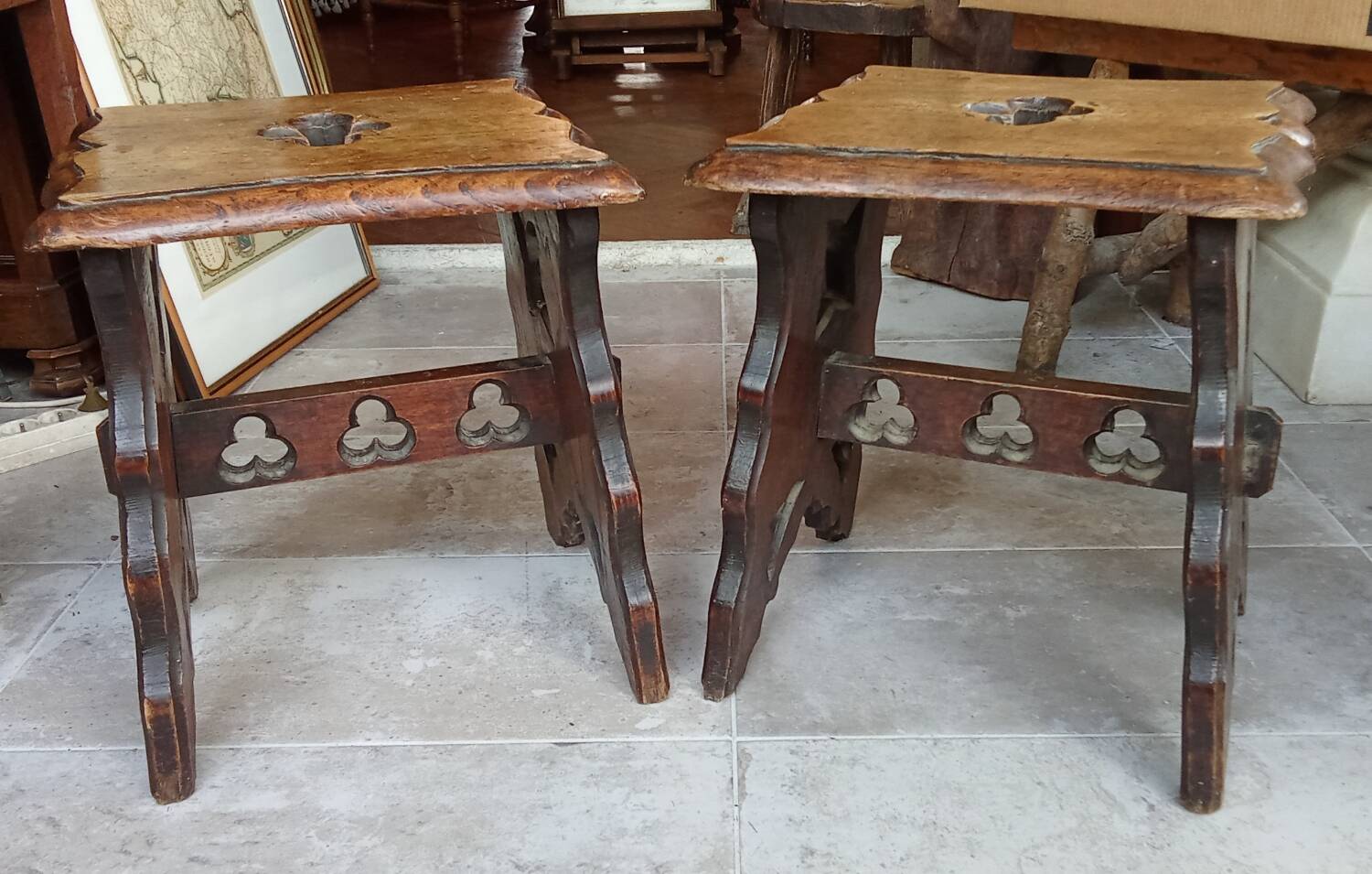 Pair of antique carved wooden stools