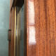 Vintage 1960s enfilade in varnished cherry wood.