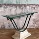 Glass and metal console with antique patina
