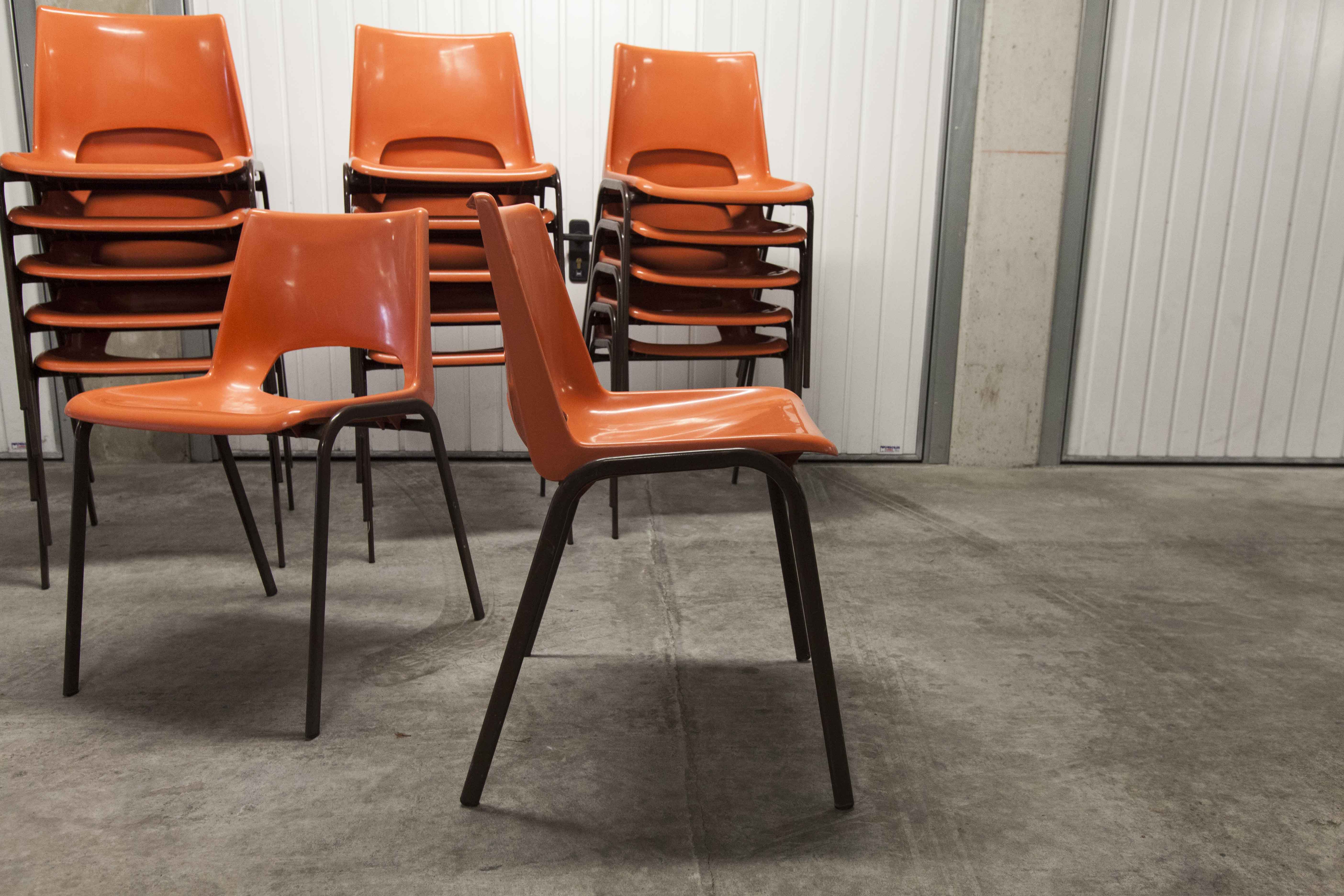 Set of 17 vintage orange chairs 1970