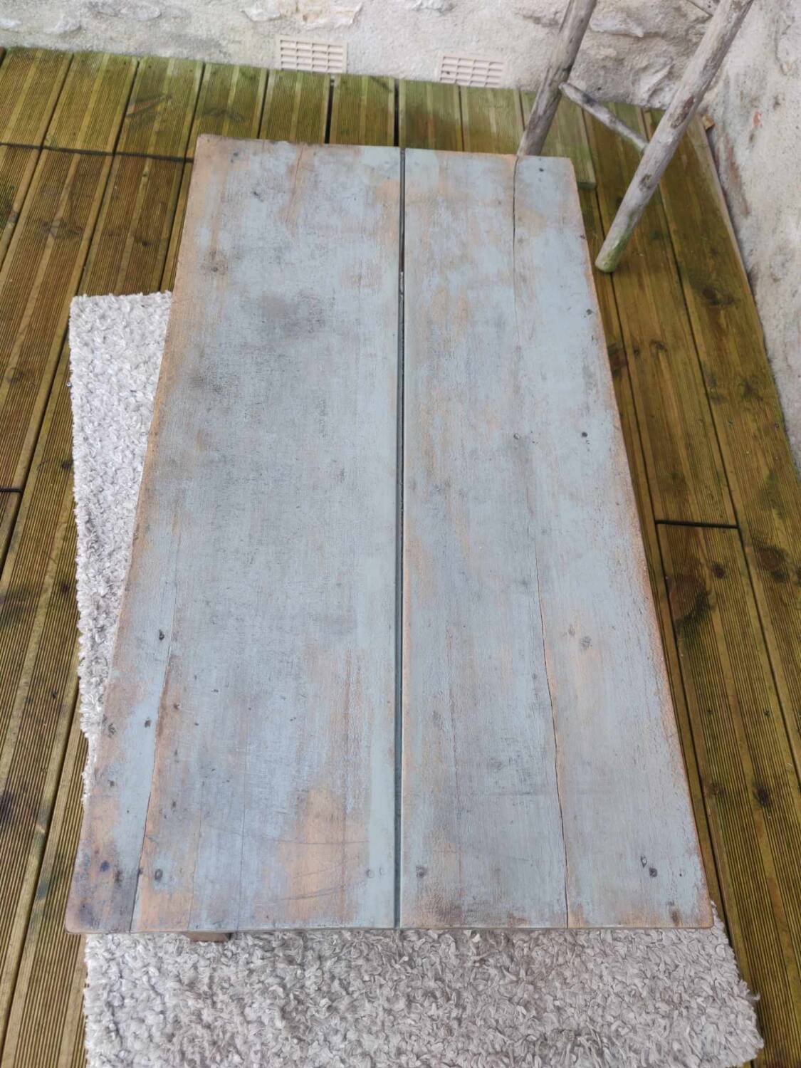 Patinated coffee table with a drawer