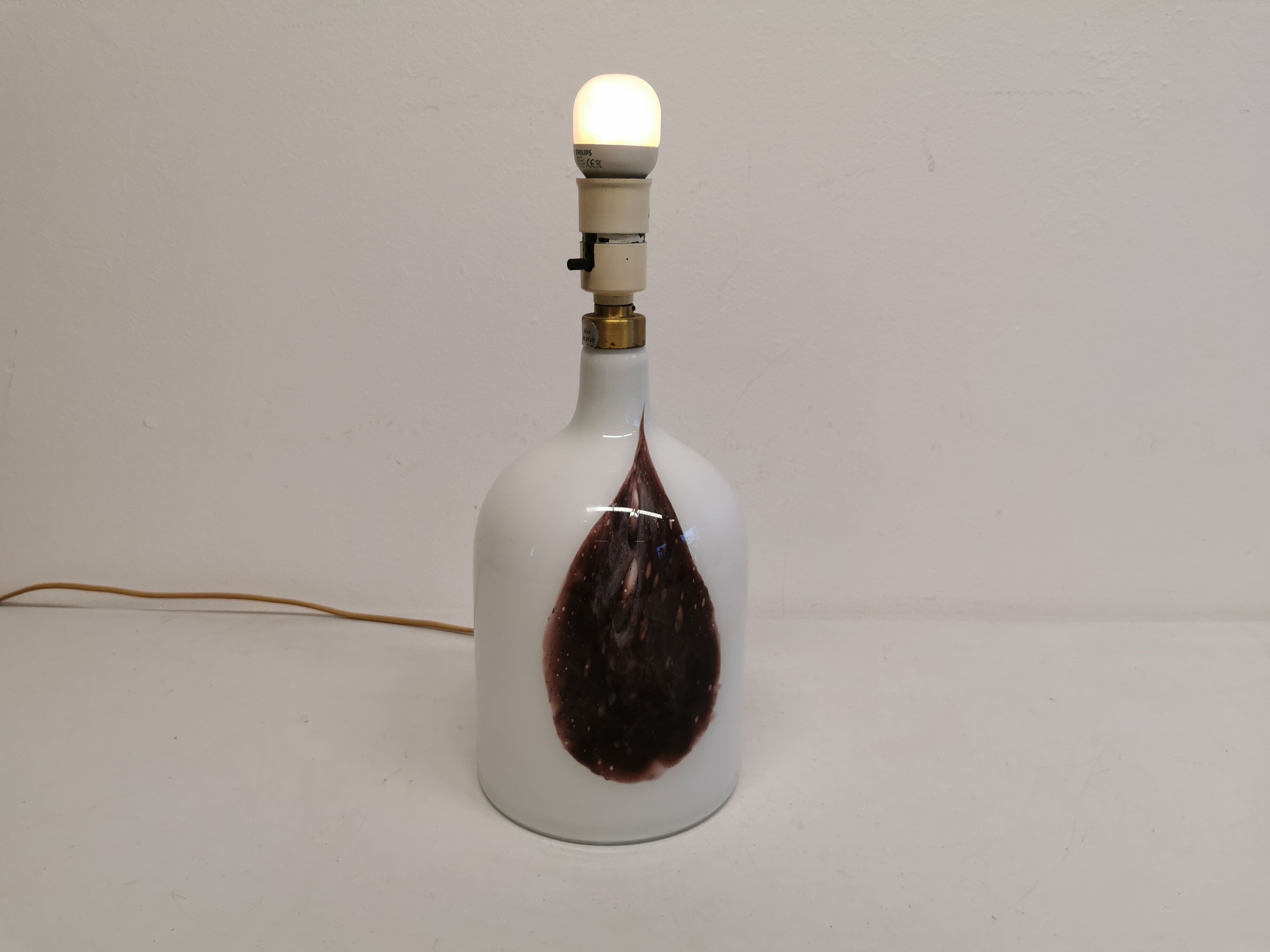 Older table lamp in milky white opaline glass with purple pattern / details from danish holmegaard.