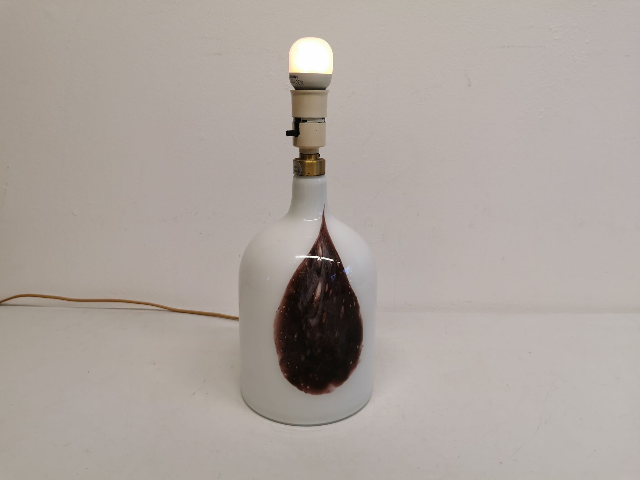 Older table lamp in milky white opaline glass with purple pattern / details from danish holmegaard.