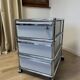 USM Haller light grey wheeled caisson