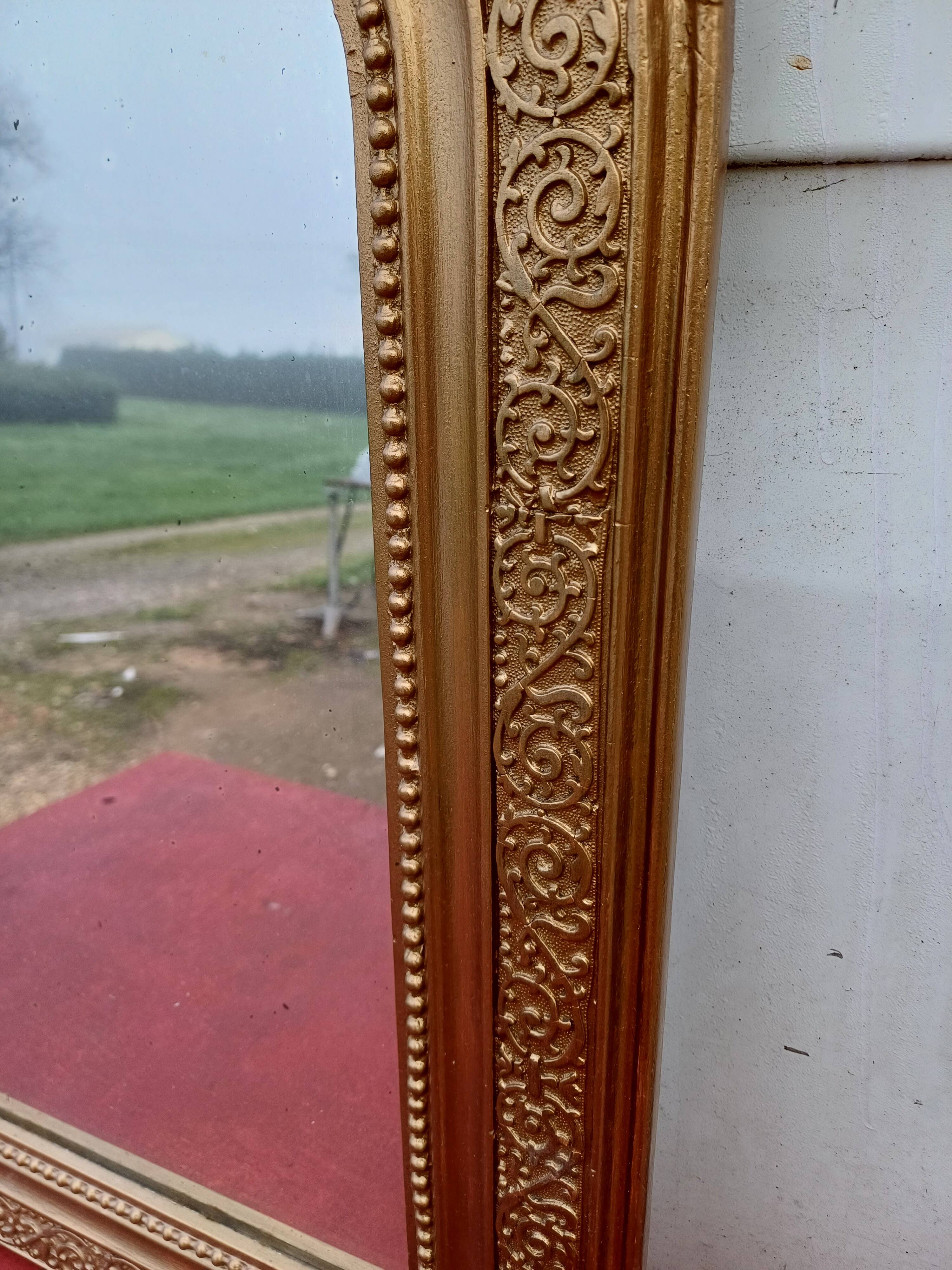 19th century wood and gilded stucco mirror