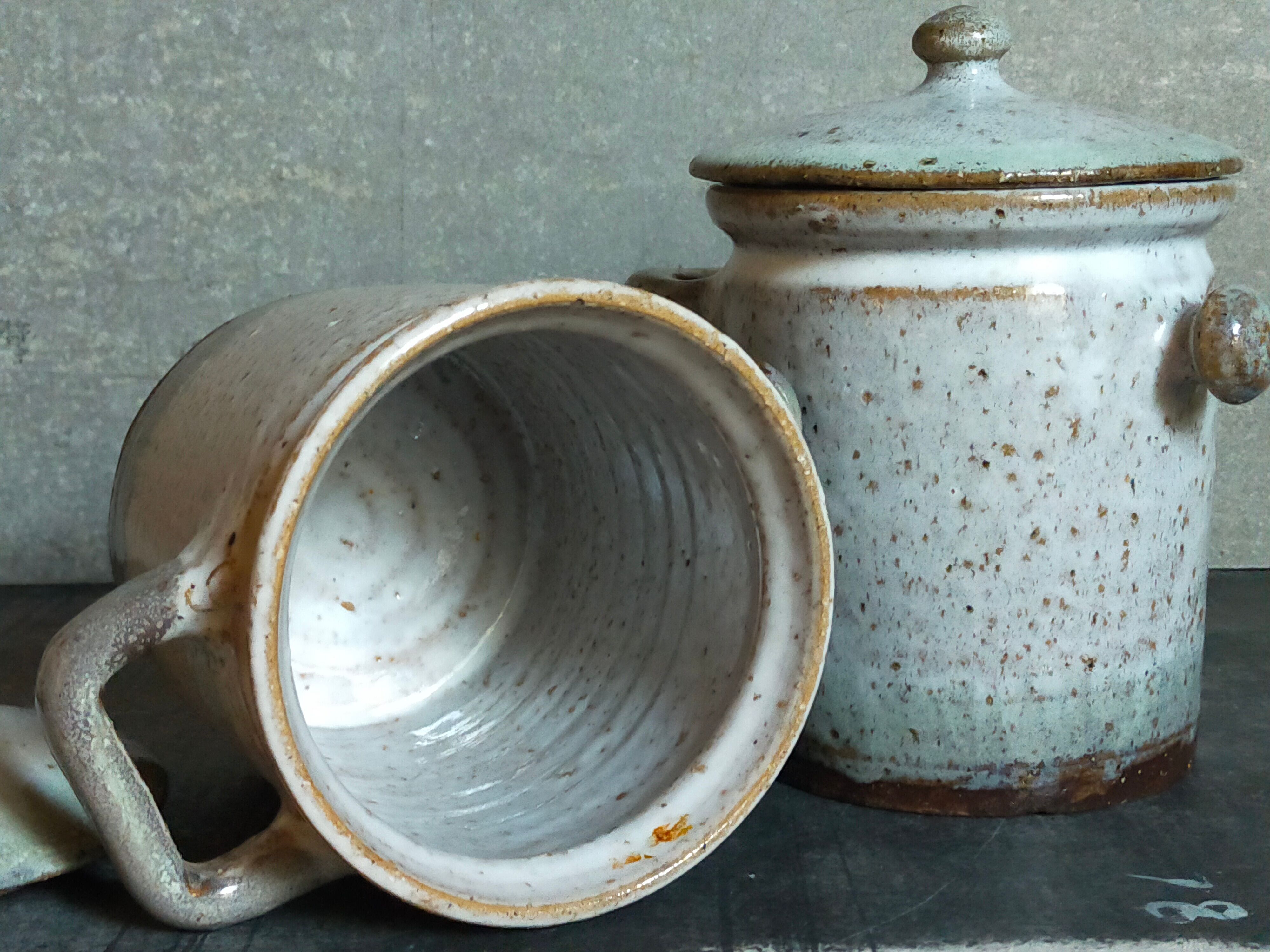 Duo of potter's pots covered in vintage glazed stoneware