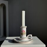 Small vintage hand-held candlestick in earthenware with green trim and floral decoration H10.5