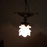 Suspension in bronze and glass paste.