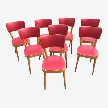 Huit chaises Bauman hêtre clair et skai rouge, années 60