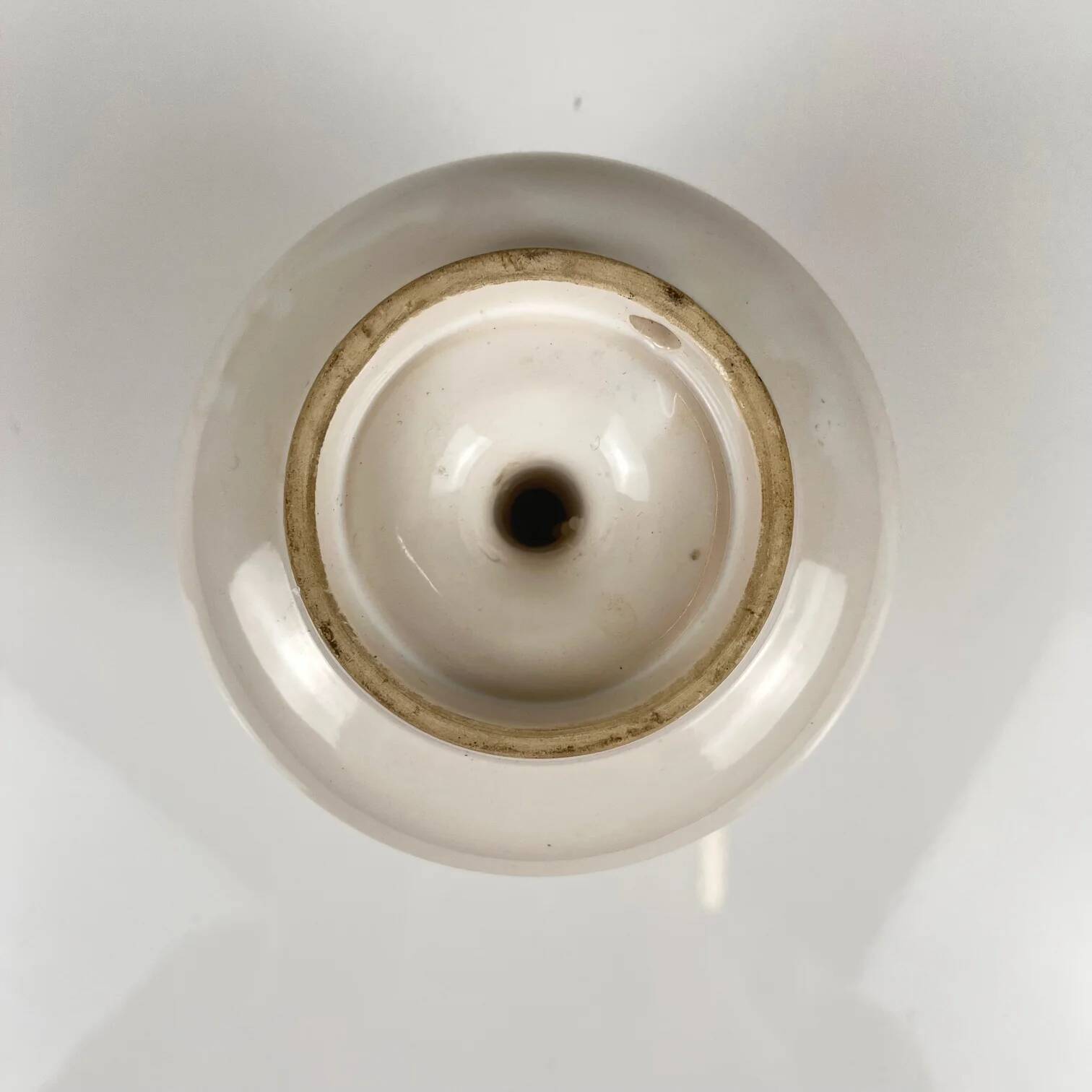 Hand-painted ceramic candlestick, flower pattern.