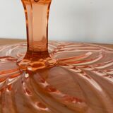 Vintage cake display in pink art deco molded glass