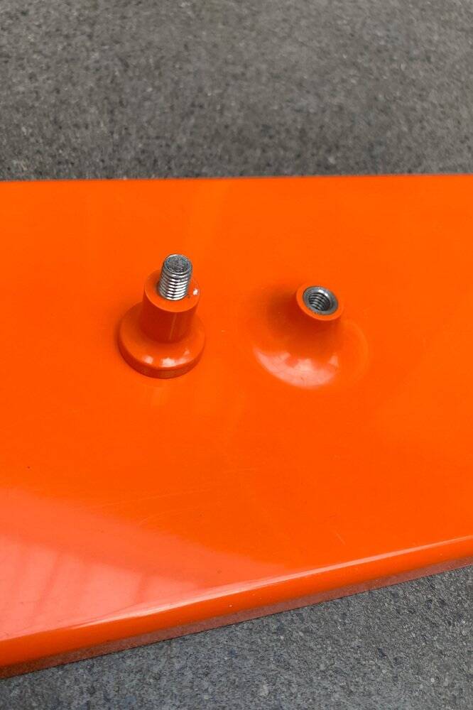 Orange coat rack from the mid-century space age, 1960s.