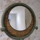 Round decorative mirror in sage green and rattan – Chic country style